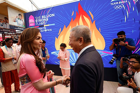 Nita Ambani shakes hands with IOC member Ser Miang Ng